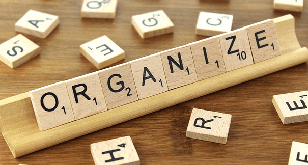 Scrabble tray with "organize:" Plan your ebook to be on target, thorough, and efficient.
